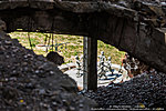 Вид на фонтан «Детский хоровод» сквозь руины